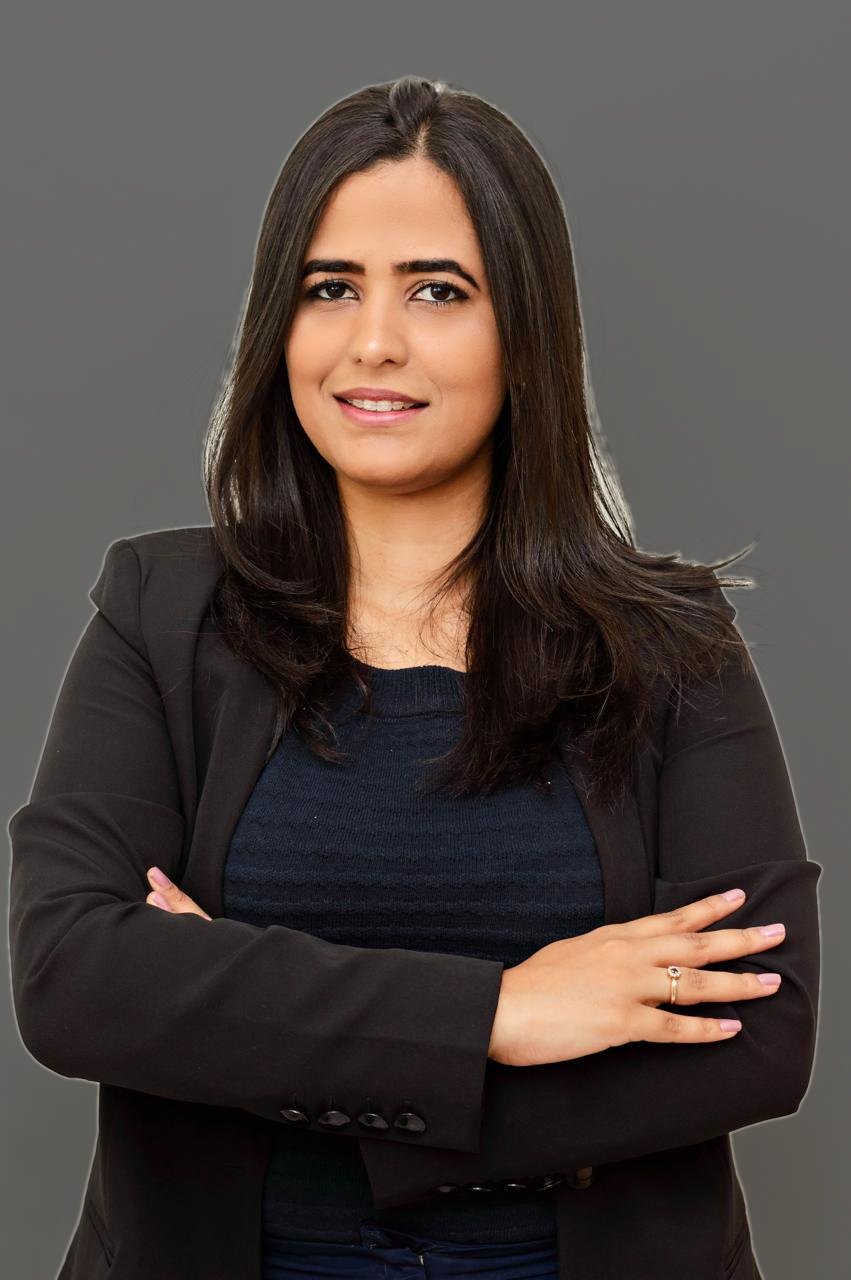 Rafaela Andrade, advogada trabalhista, em retrato profissional.